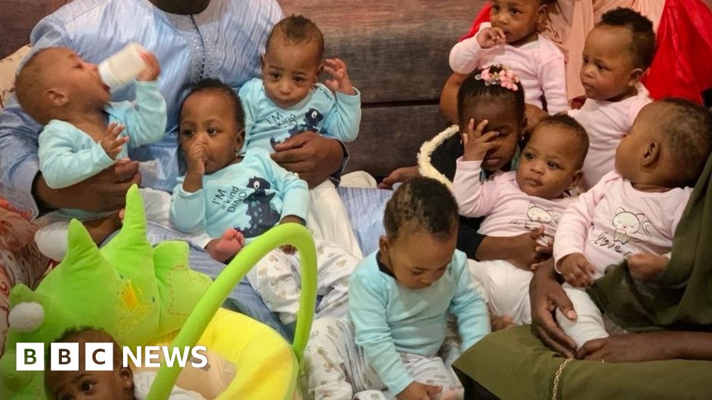 World-record nonuplets return home to Mali from Morocco - BBC News