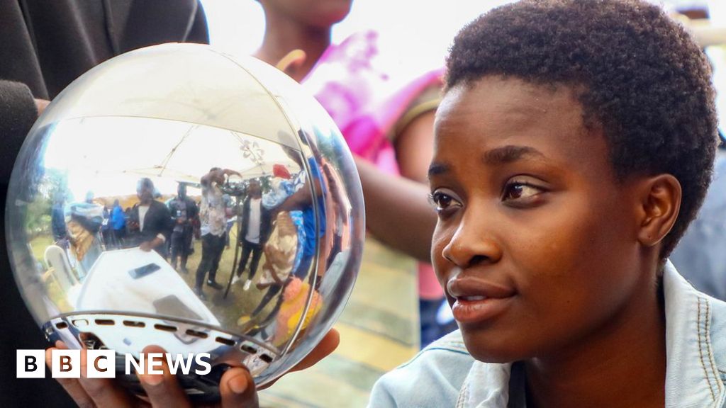 Worldcoin suspended in Kenya as thousands queue for free money - BBC News