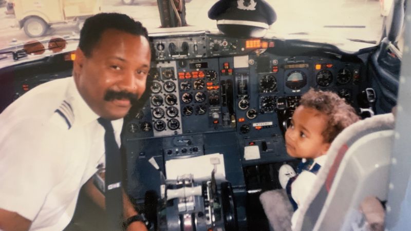 A kid posed with his pilot dad in an airplane. Almost 30 years later they recreated the photo | CNN